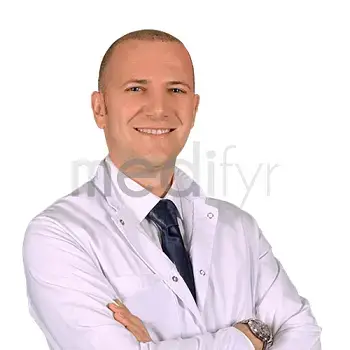 Dr. Cüneyt Karoğlu