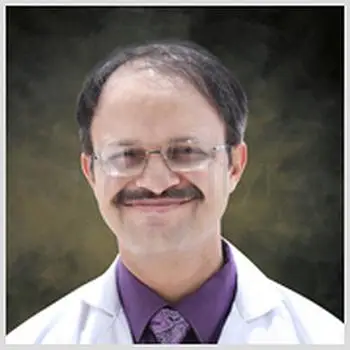 Dr. Manohar T