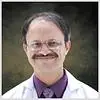 Dr. Manohar T