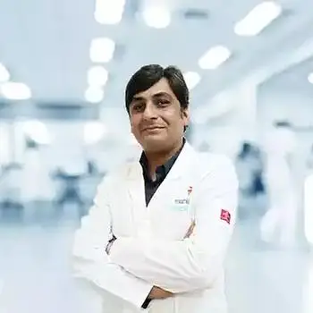 Dr. Anirudh S