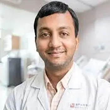 Dr. Sricharan V