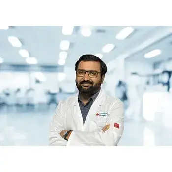 Dr. Harish E