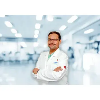 Dr. Anand M
