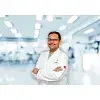 Dr. Anand M
