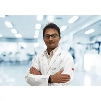 Dr. Mallesh M