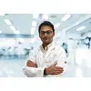 Dr. Mallesh M