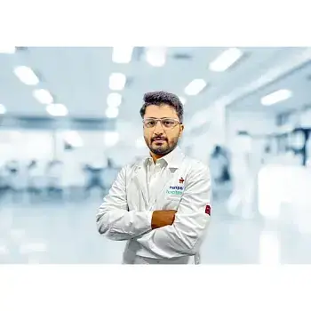 Dr. Umesh K J
