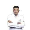 Dr. Satish T