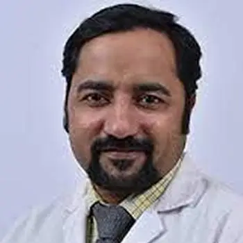 Dr. Mangesh Patil