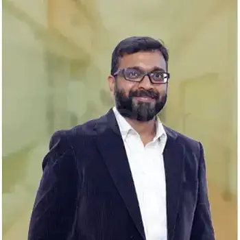 Dr. Kiran J