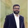 Dr. Kiran J